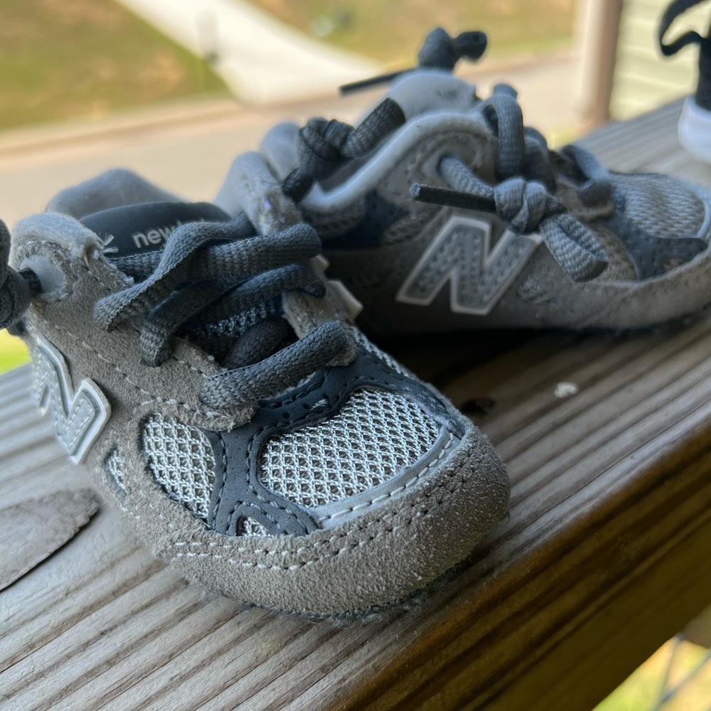 Gray new balance infant shoes.